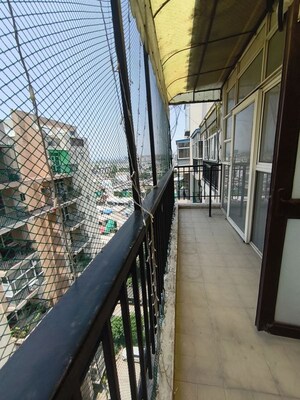 Balcony in 4 BHK Apartment at Sushma Elite Cross, Dhakoli – for Rent