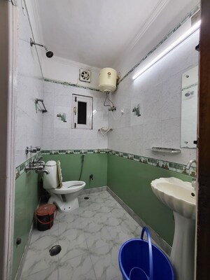 Bathroom in 2 BHK Builder Floor at Malviya Nagar – for Rent
