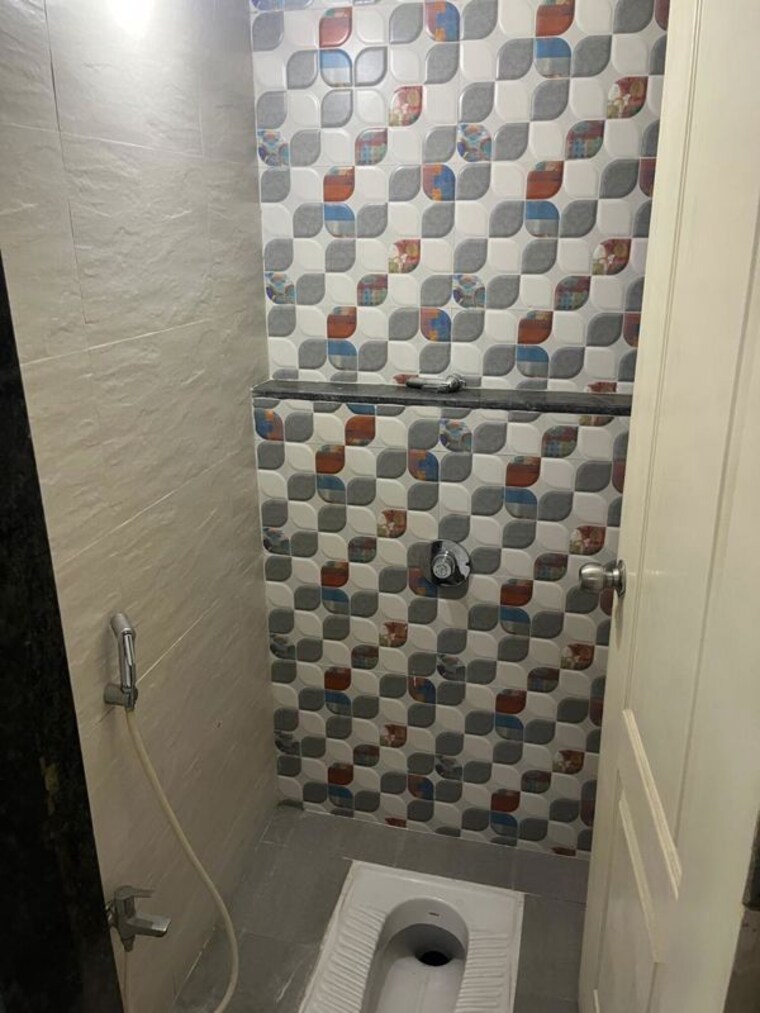 Bathroom, united-arise 1 Bedroom 700 Sq.Ft. Apartment In Lohgaon Pune 10418654