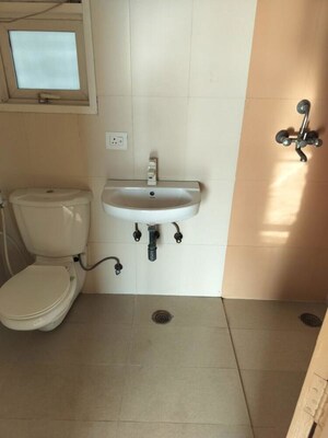 Bathroom in 3 BHK Apartment at Jaypee Greens Pavilion Court, Sector 128 – for Rent