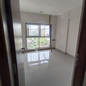 Room in 2 BHK Apartment at Mayfair Breeze, Andheri West – for Rent
