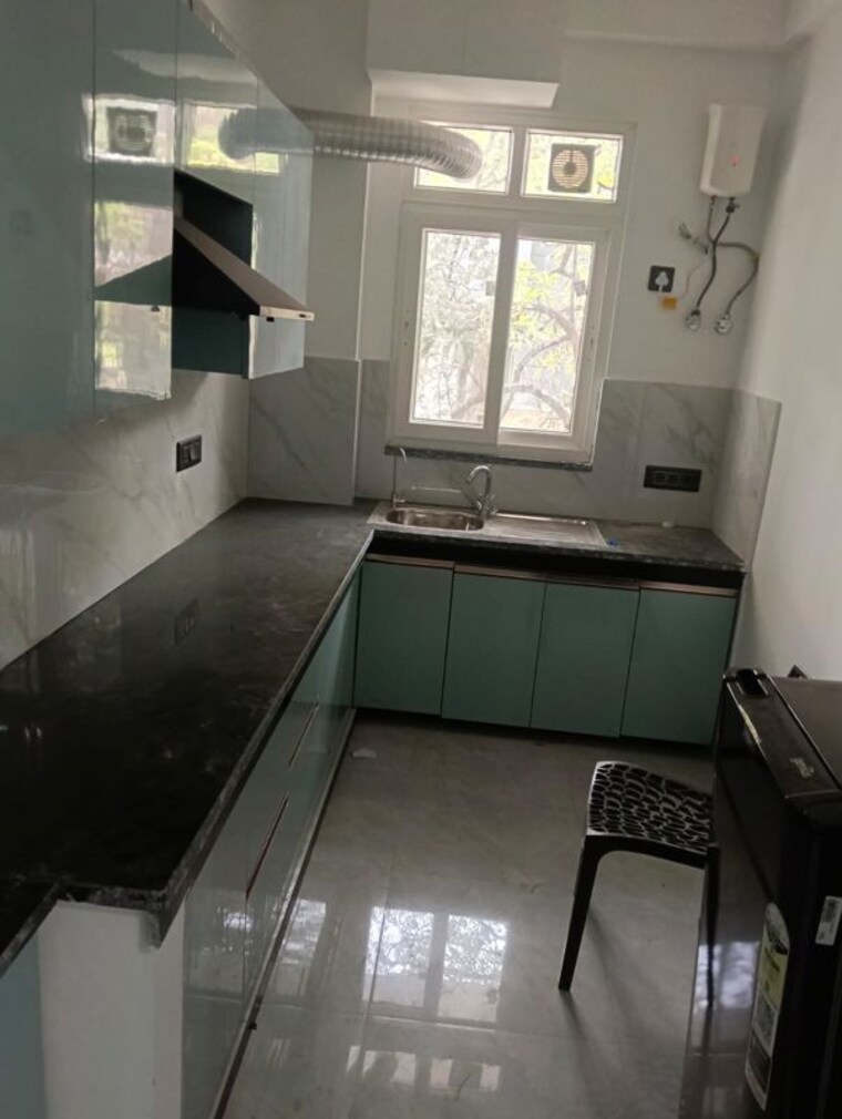 Kitchen, suncity-township-gurgaon 3 Bedroom 1600 Sq.Ft. Builder Floor In Sector 54 Gurgaon 10418795