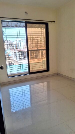Room in 2 BHK Apartment at Shree Ganpati CHS, Ulwe Sector 19 – for Rent