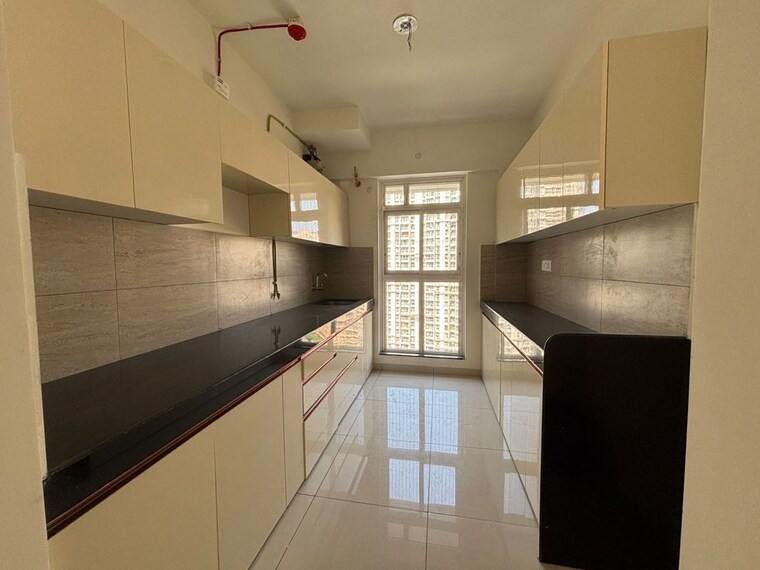 Kitchen, godrej-emerald 3 Bedroom 1000 Sq.Ft. Apartment In Ghodbunder Road Thane 10419097