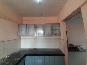 Kitchen in 3 BHK Apartment at Ganeshpeth Colony – for Rent