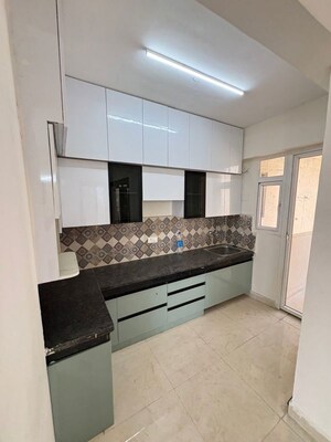 Kitchen in 2 BHK Apartment at Signature The Millennia 3, Sector 37d – for Rent