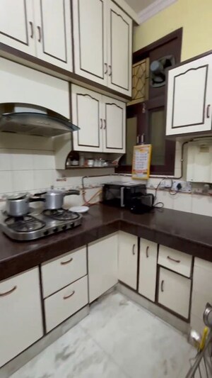 Kitchen in 3 BHK Builder Floor at Mansarover Garden – for Sale
