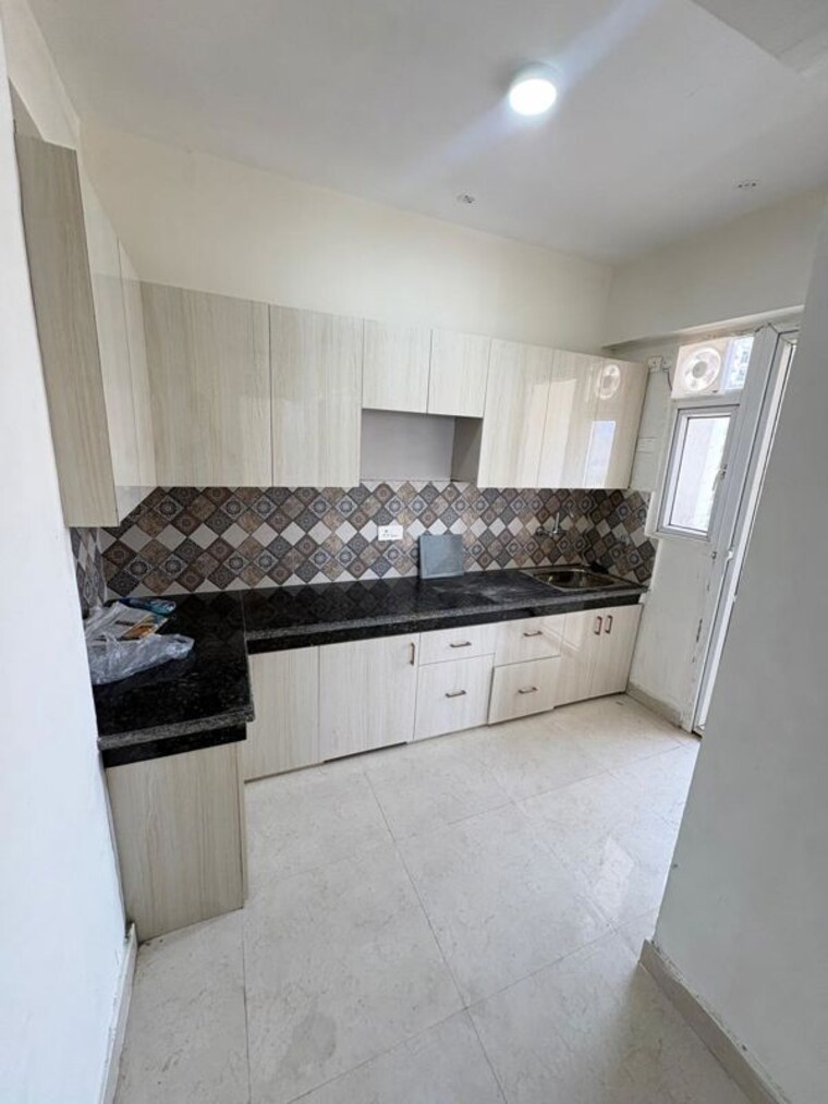 Kitchen, signature-the-millennia-3 2 Bedroom 1000 Sq.Ft. Apartment In Sector 37d Gurgaon 10419205