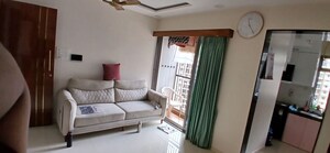 Living Room in 2 BHK Apartment at Runwal Eirene, Balkum Pada – for Rent