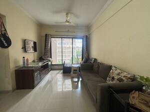 Kitchen in 2 BHK Apartment at Unnati Woods CHS, Kasarvadavali – for Sale