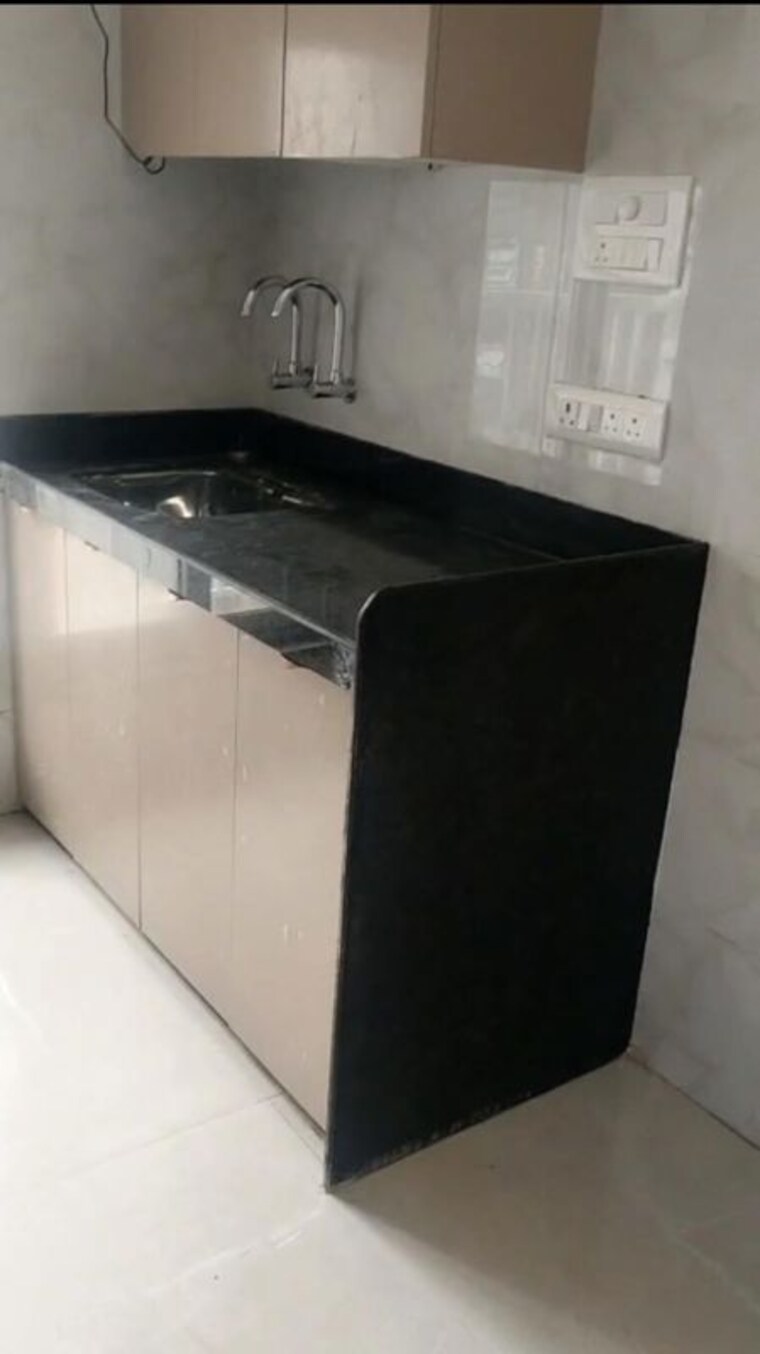 Kitchen, dn nagar 2 Bedroom 800 Sq.Ft. Apartment In Dn Nagar Mumbai 10401671