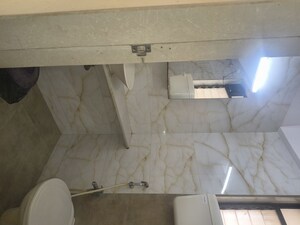 Bathroom in 2 BHK Apartment at Shanti Gardens , Mira Road – for Rent