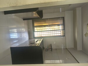 Kitchen in 2 BHK Apartment at Shanti Gardens , Mira Road – for Rent