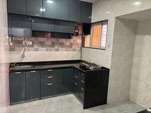Kitchen in 3 BHK Apartment at Swarna CHS, Kharghar Sector 7 – for Rent