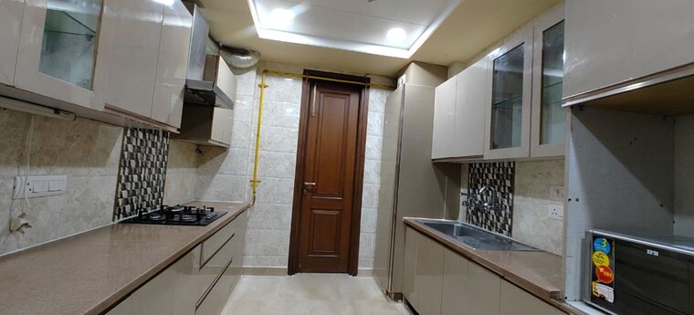 Kitchen, defence colony 3 Bedroom 3000 Sq.Ft. Apartment In Defence Colony Delhi 10419628
