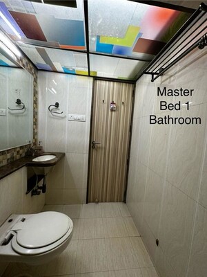 Bathroom in 3 BHK Apartment at Atul Blue Orbit, Malad West – for Rent