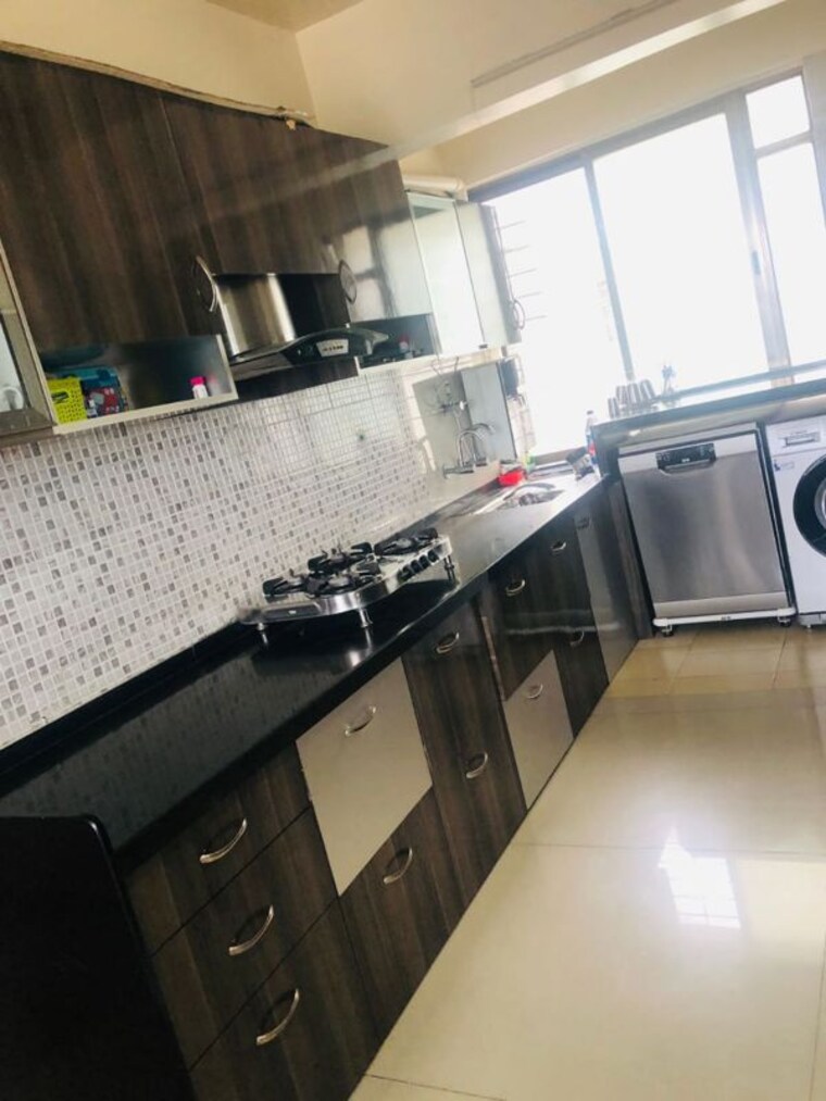 Kitchen, goel-ganga-panama 3 Bedroom 1500 Sq.Ft. Apartment In Pimple Nilakh Pune 10419925