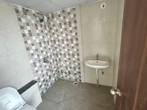 Bathroom in 3 BHK Apartment at Mantra Monarch, Balewadi – for Rent