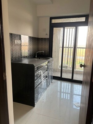 Kitchen in 2 BHK Apartment at Lodha Splendora, Ghodbunder Road – for Rent