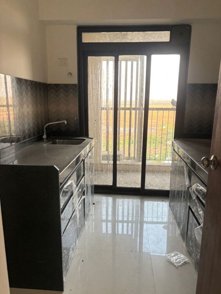 Kitchen, lodha-splendora 2 Bedroom 771 Sq.Ft. Apartment In Ghodbunder Road Thane 10419972