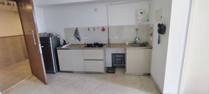 Kitchen in Studio Apartment at Hiranandani Estate Solitaire C, Ghodbunder Road – for Sale