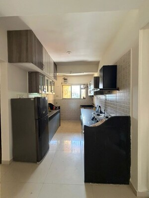 Kitchen in 2 BHK Apartment at G K Jarvari, Pimple Saudagar – for Rent