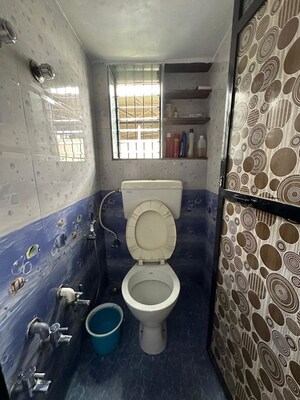 Bathroom in 1 BHK Apartment at Shree Shivshakti Darshan CHS, Dombivli East – for Rent