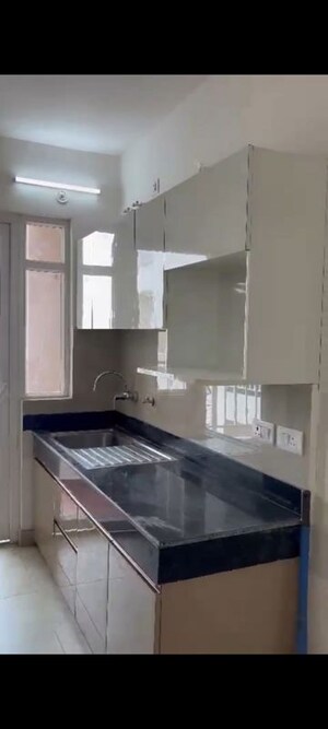 Kitchen in 2 BHK Apartment at Rishita Mulberry Heights, Sushant Golf City – for Rent