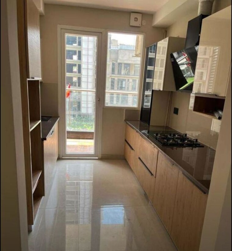 Kitchen, the-ananta-aspire 3 Bedroom 2250 Sq.Ft. Apartment In Utrathiya Zirakpur 10420155