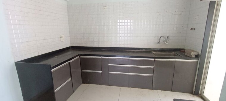 Kitchen, mulik-corp-luxuria 2 Bedroom 815 Sq.Ft. Apartment In Wagholi Pune 10420161