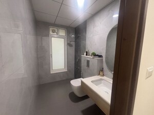 Bathroom in 4 BHK Apartment at Godrej Blue, B L Saha Road – for Sale