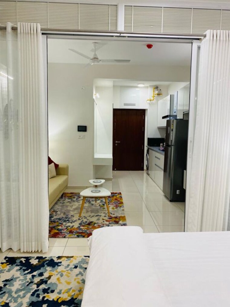 Living Room, l-t-raintree-boulevard 1 Bedroom 500 Sq.Ft. Apartment In Hebbal Bangalore 10420187