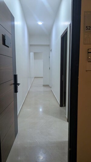Building Lobby in 2 BHK Apartment at Omkar Alta Monte, Malad East – for Rent