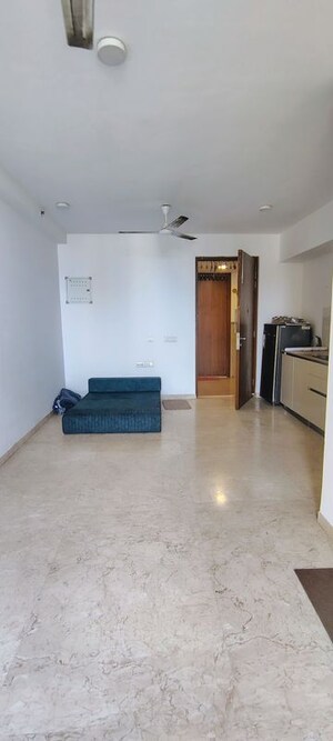 Living Room in Studio Apartment at Hiranandani Estate Solitaire C, Ghodbunder Road – for Rent