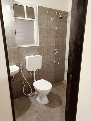Bathroom in 2 BHK Apartment at Mantra Essence, Undri – for Rent