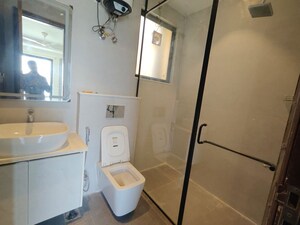 Bathroom in 4 BHK Apartment at Ansal API Versalia, Sector 67a – for Rent