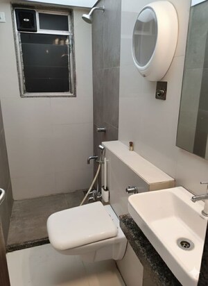Bathroom in 2 BHK Apartment at Lalani Valentine Apartment 1 Wing D, Malad East – for Rent