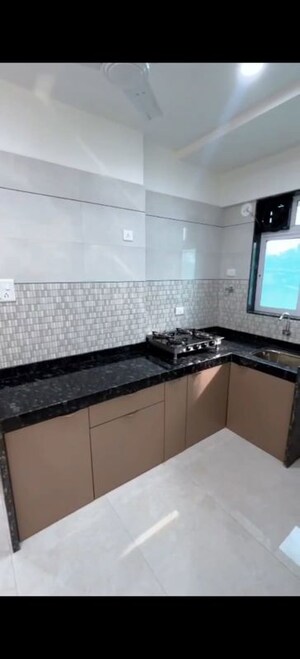 Kitchen in 1 BHK Apartment at Atlanta Avadh, Ulhasnagar – for Sale