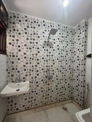 Bathroom in 1 BHK Builder Floor at Freedom Fighters Enclave – for Rent