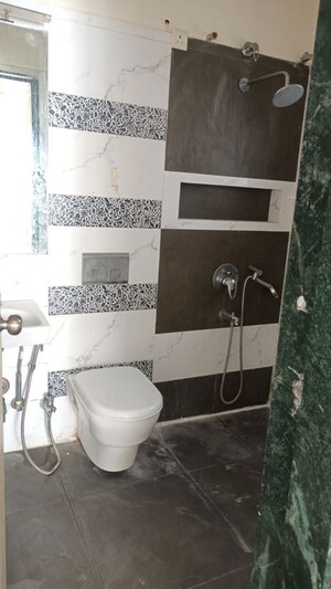 Bathroom in 2.5 BHK Apartment at Runwal Seagull, Hadapsar – for Rent