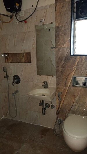 Bathroom in 2.5 BHK Apartment at Runwal Seagull, Hadapsar – for Rent