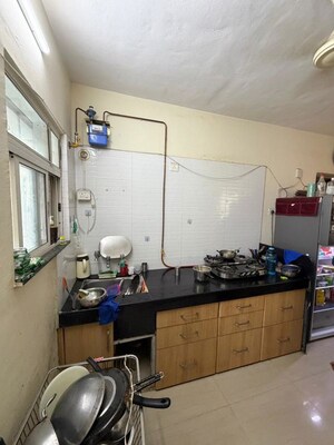 Kitchen in 2 BHK Apartment at Sai Shree CHS Ltd, Pimple Saudagar – for Sale