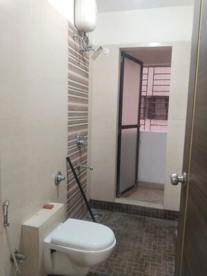 Bathroom in 2 BHK Apartment at Tharwani Rosewood Heights, Kharghar Sector 10 – for Rent