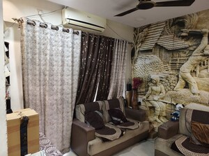 Living Room in 2 BHK Apartment at Tharwani Rosewood Heights, Kharghar Sector 10 – for Rent