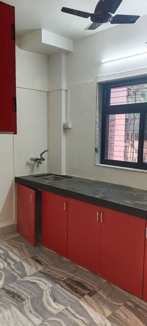 Kitchen in 2 BHK Apartment at Victoria Apartment Andheri, Andheri West – for Rent