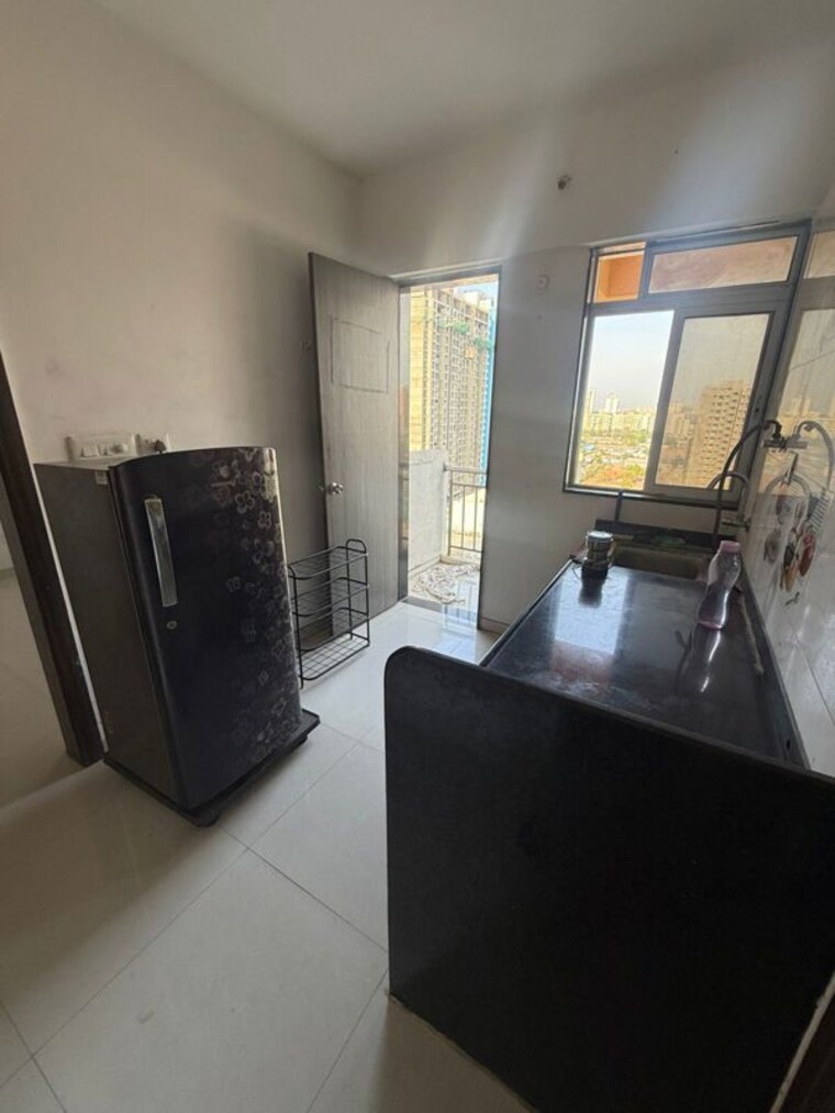 Kitchen, somani-dream-home 2 Bedroom 720 Sq.Ft. Apartment In Punawale Pune 10420601