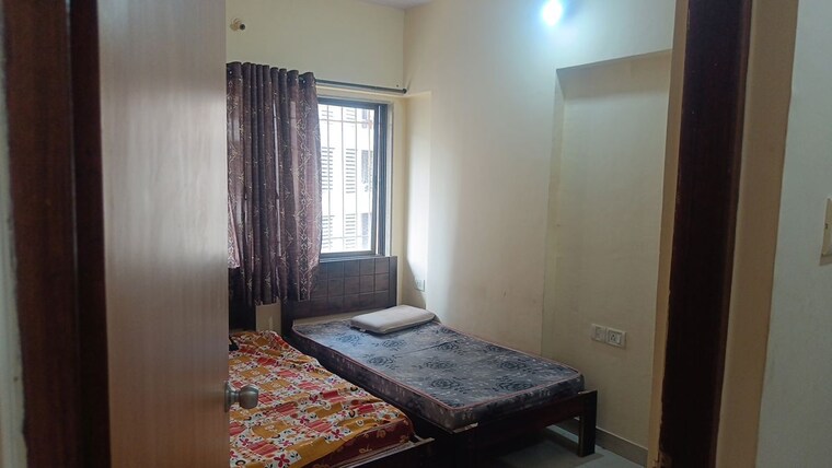 Bedroom, kopar khairane Pg For Girls In Kopar Khairane 10420596