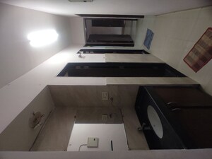 Kitchen in 2.5 BHK Apartment at Neptune Living Point, Bhandup West – for Sale