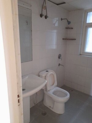Bathroom in 3 BHK Apartment at Dhoot Time Residency, Sector 63 – for Sale