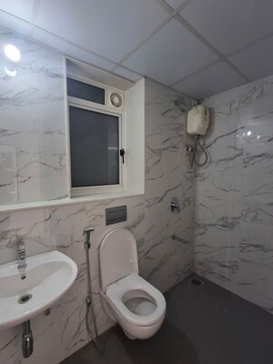 Bathroom in 2 BHK Apartment at Runwal Gardens, Dombivli East – for Rent